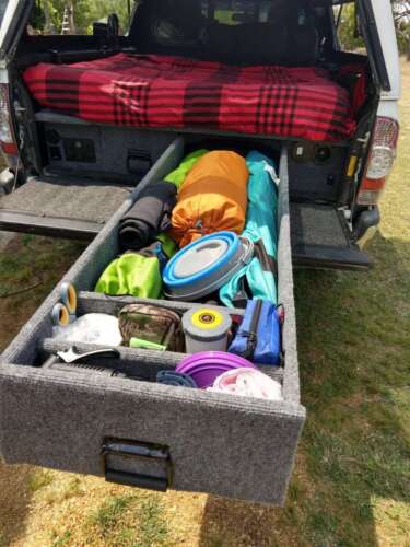 gear-drawer with water system hose and nozzle in front section
